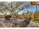 Landscaped backyard with desert plants, gravel, and a metal fence at 14731 W Trading Post Dr, Sun City West, AZ 85375