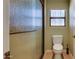 Small bathroom with toilet and shower, updated fixtures at 14731 W Trading Post Dr, Sun City West, AZ 85375