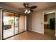 Dining area with access to a patio and hot tub at 14731 W Trading Post Dr, Sun City West, AZ 85375