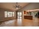 Dining area with tile floor, kitchen access and sliding doors to patio at 14731 W Trading Post Dr, Sun City West, AZ 85375