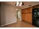 Kitchen area with wood cabinets, black appliances and tile floor at 14731 W Trading Post Dr, Sun City West, AZ 85375