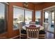 Bright breakfast nook with table and chairs, overlooking the backyard at 16148 W Sentinel Dr, Sun City West, AZ 85375