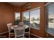 Charming breakfast nook with window seating and view of the garden at 16148 W Sentinel Dr, Sun City West, AZ 85375