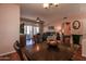 Open dining room with hardwood floors and chandelier at 16148 W Sentinel Dr, Sun City West, AZ 85375