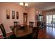 Dining area with hardwood floors and view to living room at 16148 W Sentinel Dr, Sun City West, AZ 85375