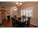 Dining area with dark wood table and chairs at 16148 W Sentinel Dr, Sun City West, AZ 85375