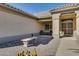 Front entry with security door and stone bench at 16148 W Sentinel Dr, Sun City West, AZ 85375