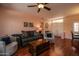 Living room with hardwood floors and comfortable seating at 16148 W Sentinel Dr, Sun City West, AZ 85375