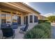 Covered patio with seating area and views of the backyard at 16148 W Sentinel Dr, Sun City West, AZ 85375