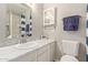 Modern bathroom with marble-look tile and updated vanity at 16807 E Gunsight Dr # B23, Fountain Hills, AZ 85268