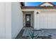 Modern farmhouse front entrance with black door and welcoming sign at 17155 W Gracemont St, Surprise, AZ 85388