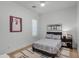 Modern bedroom with a gray bedspread, basketball decor and ample natural light at 17708 N 92Nd St, Scottsdale, AZ 85255