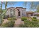 Beautiful two-story home with a welcoming front porch and landscaping at 17708 N 92Nd St, Scottsdale, AZ 85255