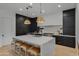 Modern kitchen with a large island and white countertops at 17708 N 92Nd St, Scottsdale, AZ 85255