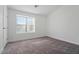 Bright bedroom with neutral carpeting and large window at 18815 N 34Th Ave # 4, Phoenix, AZ 85027