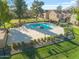 Community swimming pool with surrounding lawn at 18815 N 34Th Ave # 4, Phoenix, AZ 85027