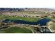 Golf course with water feature and mountain view at 20090 W Badgett Ln, Litchfield Park, AZ 85340