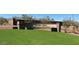 Community entrance with Canyon Views signage and landscaping at 20090 W Badgett Ln, Litchfield Park, AZ 85340