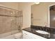 Bathroom with granite vanity and shower/tub combo at 2105 E Kerry Ln, Phoenix, AZ 85024