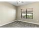 Spacious bedroom with carpeted floors and large window at 21320 N 56Th St # 1133, Phoenix, AZ 85054