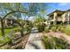 Landscaped walkway leading to community buildings at 21320 N 56Th St # 1133, Phoenix, AZ 85054