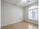 Spacious bedroom with wood flooring and large window at 2250 E Deer Valley Rd # 48, Phoenix, AZ 85024