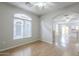 Bright dining room with wood flooring and arched doorway at 2250 E Deer Valley Rd # 48, Phoenix, AZ 85024