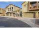 Two-story townhome with attached garage and landscaped front at 2250 E Deer Valley Rd # 48, Phoenix, AZ 85024