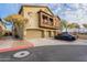 Two-story townhome with attached garage and spacious driveway at 2250 E Deer Valley Rd # 48, Phoenix, AZ 85024