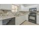 Kitchen boasts granite countertops and modern appliances at 2250 E Deer Valley Rd # 48, Phoenix, AZ 85024