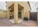 Covered patio, built-in grill, and AC unit at 2250 E Deer Valley Rd # 48, Phoenix, AZ 85024