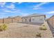 Landscaped backyard with gravel and small plants at 23120 E Twilight Dr, Queen Creek, AZ 85142