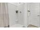 Clean bathroom with shower, and white tile at 23120 E Twilight Dr, Queen Creek, AZ 85142