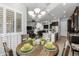 Casual dining area with a round wooden table and green accents at 2653 E Marcos Dr, Casa Grande, AZ 85194