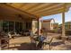 Patio with pergola, seating area, and view of the surrounding neighborhood at 2653 E Marcos Dr, Casa Grande, AZ 85194