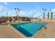 Large community pool with plenty of lounge chairs at 2701 E Allred Ave # 110, Mesa, AZ 85204