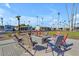 Patio area with fire pit and comfortable seating at 2701 E Allred Ave # 110, Mesa, AZ 85204