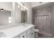 Modern bathroom featuring a walk-in shower at 2716 N 88Th Ln, Phoenix, AZ 85037