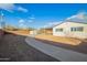 Backyard with shed and pathway leading to the house at 2870 W Manzanita St, Apache Junction, AZ 85120