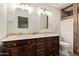 Elegant bathroom with double vanity and tiled shower at 2870 W Manzanita St, Apache Junction, AZ 85120