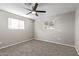 Bright bedroom with carpet and ceiling fan at 2870 W Manzanita St, Apache Junction, AZ 85120