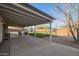 Relaxing covered patio area with seating and views of the backyard at 2870 W Manzanita St, Apache Junction, AZ 85120