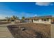 Charming ranch style home with a spacious front yard and walkway at 2870 W Manzanita St, Apache Junction, AZ 85120