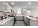 Modern kitchen with stainless steel appliances and marble countertops at 2870 W Manzanita St, Apache Junction, AZ 85120