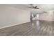 Open living room, view of kitchen, laminate floors at 2870 W Manzanita St, Apache Junction, AZ 85120