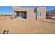 Backyard view of house with patio and gravel at 3015 W Paraiso Dr, Eloy, AZ 85131