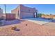 New construction home with a spacious driveway and side yard at 3015 W Paraiso Dr, Eloy, AZ 85131