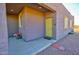 Front entryway with a yellow door and brick pathway at 3015 W Paraiso Dr, Eloy, AZ 85131