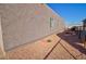 Side view of house with gravel landscaping at 3015 W Paraiso Dr, Eloy, AZ 85131