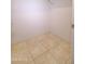 Small storage room with beige tile flooring at 3015 W Paraiso Dr, Eloy, AZ 85131